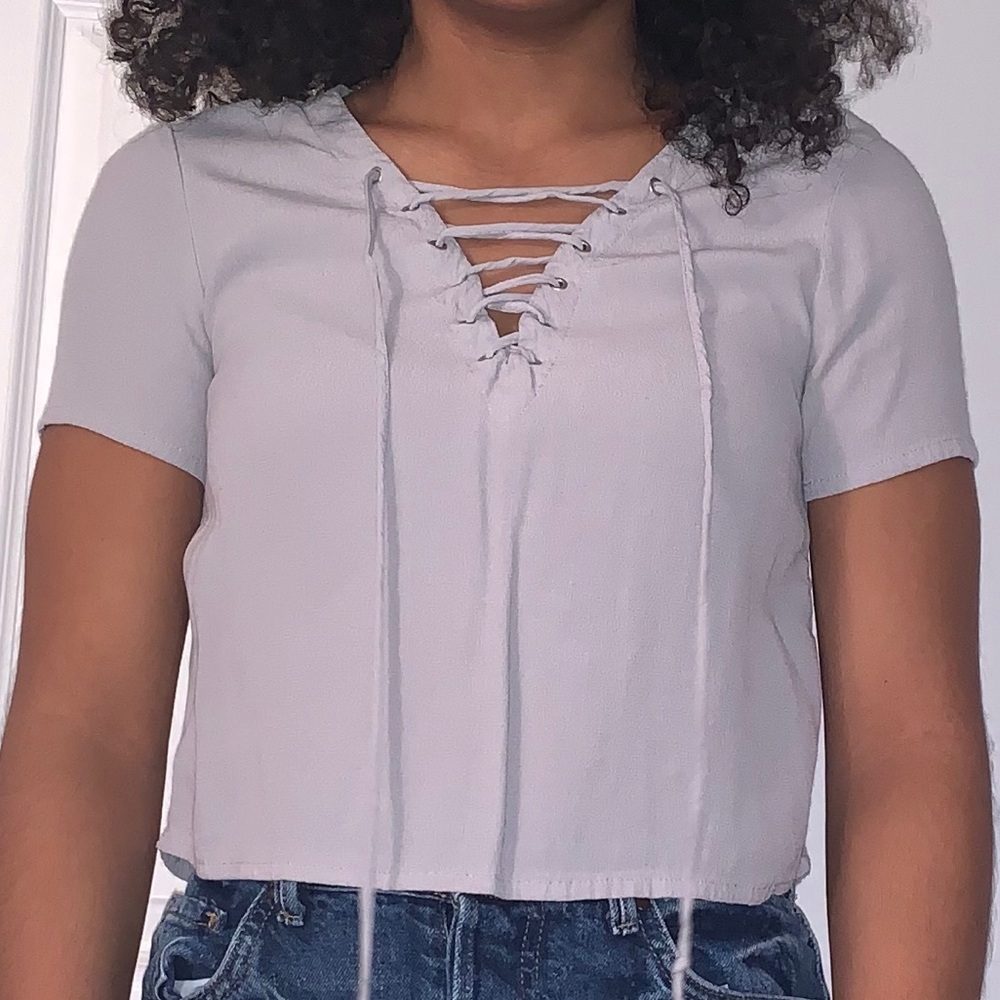 Grey cropped lace up top